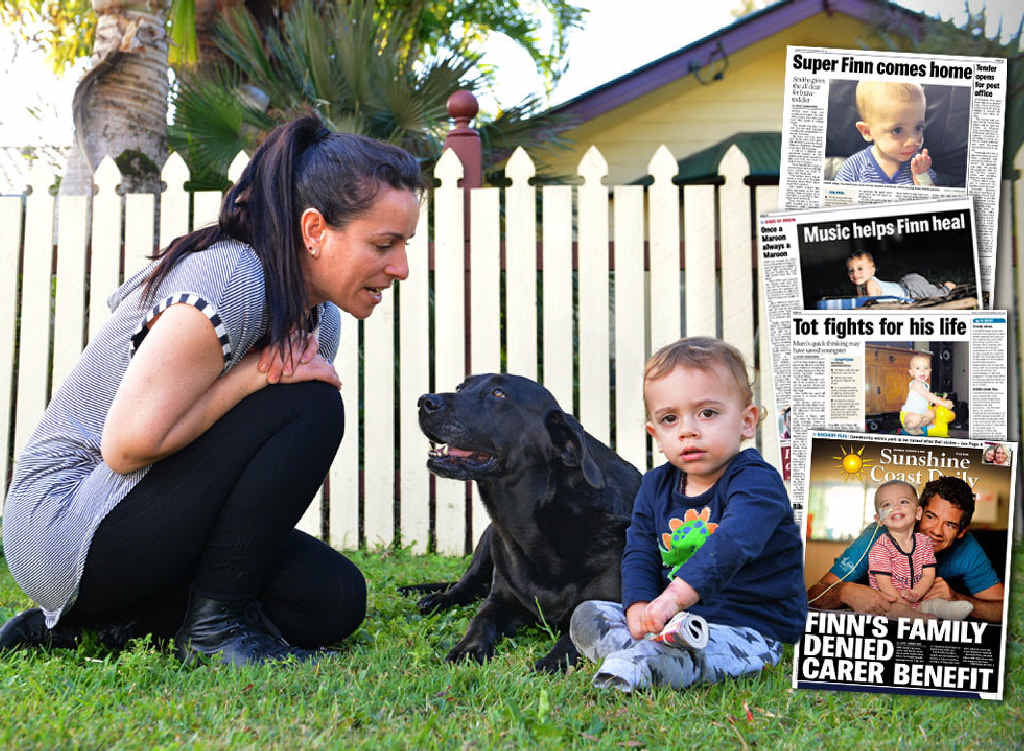 BIG DAY COMING: Young Finn Smith plays in the front yard with his mum Sarah and pet dog Easter. BIG DAY COMING: Young Finn Smith plays in the front yard with his mum Sarah and pet dog Easter.